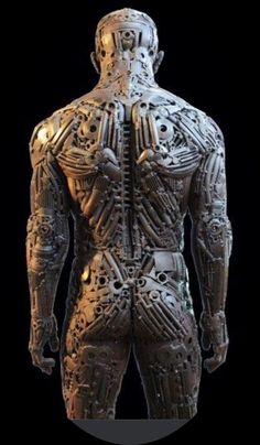 the back view of a man's body made out of metal parts and gears