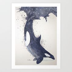 an orca whale in the water under a tree