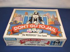 an unopened monopoly dice box with the words don't go to jail on it