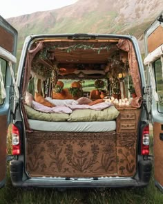 the back end of a van with an open bed