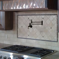 a stove top oven sitting inside of a kitchen