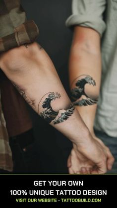 two people holding hands with tattoos on their arms and the words get your own unique tattoo design