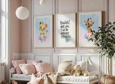 a bedroom with pink walls and pictures on the wall, including a white daybed