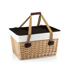 a wicker picnic basket with leather handles