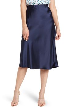 Elevate your wardrobe with this pull-on bias satin midi skirt for elegant, feminine style. 31" length (size S) Elasticized waist Pull-on style Satin construction 97% polyester, 3% spandex Machine wash cold, line dry Made in USA Model’s stats for sizing: 5’10” height, 34” bust, 27” waist, 35” hips. Model is wearing size S. Silk Knee-length Skirt For Night Out, Formal Satin Knee-length Skirt, Satin Midi-length Bottoms For Work, Satin Midi Bottoms For Workwear, Elegant Satin Midi Bottoms, Elegant Satin Midi Length Bottoms, Sleek Satin Bottoms Midi Length, Sleek Satin Midi Bottoms, Formal Knee-length Satin Skirt