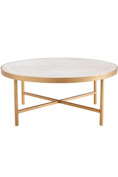 an oval coffee table with gold legs and a white marble top, against a white background