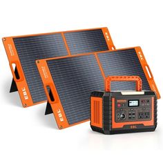 two orange and black portable solar power systems