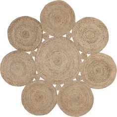 the round rugs are arranged on top of each other