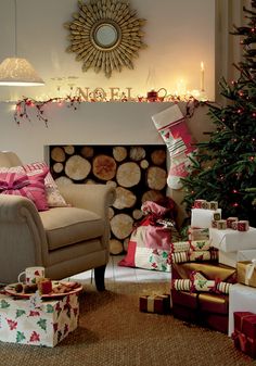 a living room decorated for christmas with presents