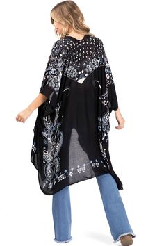 Printed lightweight cardigan, with split on sides and an open front style with an asymmetrical length. Dropped?sleeves and sheer fabric. Looks great layered over casual outfits. CARE | Hand Wash ColdCONTENTS | 100% ViscoseMEASUREMENTS | 38"/96 cm Top to Bottom (Size O/S) MODEL | 5'8 - wearing O/SIMPORTED Chic Spring Layering Cover-up, Casual Wrap Cardigan For Beach Cover-up, Casual Black V-neck Kimono, Oversized V-neck Cover-up For Spring, Casual Flowy Tunic Cover-up, Summer V-neck Beach Cover-up Outerwear, Casual V-neck Rayon Kimono, Oversized Wrap Tops For Summer, Oversized Spring Tunic Cover-up