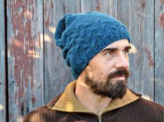 KUMO is a winterproof hat with a beautiful cably texture and easy to knit.\r\nThe pattern includes instructions for a slouchy and a men's version.\r\n\r\nFinished measurements:\r\n\r\nSlouchy: circumference: 51cm/20inch; length 28cm/11inch\r\nMen's: circumference: 45c Fair Isle Hat, Sweater Hat, Winter Warmers, Hat Knitting Patterns, Mens Winter Fashion, Knit Or Crochet, Yarn Art, Men Winter, Hat Pattern