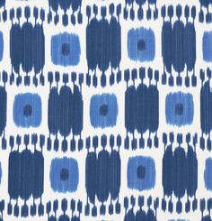 an abstract blue and white pattern on fabric