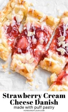 strawberry cream cheese danish made with puff pastry and almonds on parchment paper, cut into squares