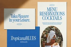 two menus with blue and white designs on them