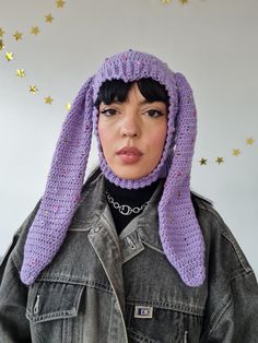 Our pastel beaded lavender purple Bunnnyclava! Features a v-shaped face frame that draws attention to your eyes. The head and ears are embellished with pastel glittery beads, please note that the placement will be unique on each piece Has our standard ribbed face and neck for a comfy close fit. One size but stretches to fit and pulls over the head easily. The v-shaped point can need adjusting to sit central on your face as everyone's head is different. Handmade with 100% wool Wipe clean with dam Beaded Lavender, Face Frame, Rainbow Beads, Bunny Ears, Lavender Purple, La Pointe, Bunny Ear, Face Framing, Be Unique