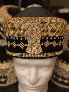 Hand made luxury hat Size 23 medium Gold embellished hat Luxury High Crown Hats For Men, Luxury Elegant Top Hat For Men, Luxury Gold Hat For Wedding, Cheap Gold Snapback Hat, Luxury Formal Hats With Structured Crown, Luxury Formal Hat With Structured Crown, Traditional Gold Costume Hats For Party, Gold High Crown Costume Hat, Elegant Gold Costume Hats And Headpieces For Ceremonial