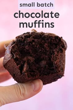 a hand holding a chocolate muffin with the words small batch chocolate muffins