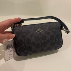 Brand New With Tag. Color: Midnight Navy Measurements: 7 1/2” (L) X 4 1/2” (H) X 2”)W) Classic Gray Shoulder Bag For Evening, Gray Luxury Shoulder Bag For Evening, Luxury Gray Evening Bag, Gray Evening Bag With Detachable Strap, Evening Bag With Detachable Strap In Gray, Gray Evening Bag With Silver-tone Hardware, Gray Evening Shoulder Bag With Removable Pouch, Gray Evening Shoulder Bag With Detachable Strap, Gray Evening Clutch Bag