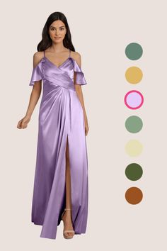 a woman in a long purple dress standing next to an assortment of color swatches