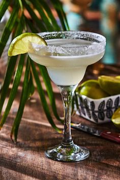 a margarita sitting on top of a wooden table