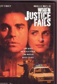 the dvd cover for when justice falls, which features an image of two men and a police car