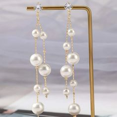 This Unique Pair Is A Wonderful Addition To Your Wardrobe And Your Style; Sure To Get Lots Of Compliments! Gsun0y50000hv8u White Chandelier Earrings With Pearl Chain For Party, Diy Earrings Pearl, Boho Drop Earrings, Pearl Cluster Earrings, Tassel Drop Earrings, Pearl Cluster, Heart Drop Earrings, Rhinestone Studs, Flower Earrings Studs