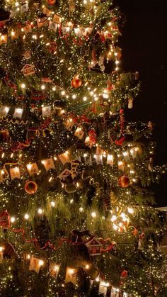 a christmas tree with lights and ornaments on it