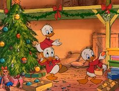 donald duck and friends around the christmas tree