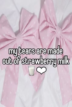 two pink bows with the words my tears are made out of strawberry milk