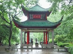 a pagoda in the middle of a park