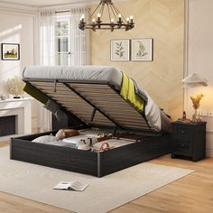 a bed that is sitting in the middle of a room with a drawer underneath it