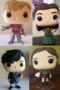 four different pop - up figurines are shown in the same photo, each with their own character