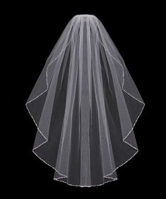 a white veil on top of a black background