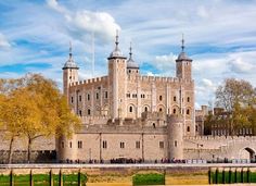 an old castle with two towers on top