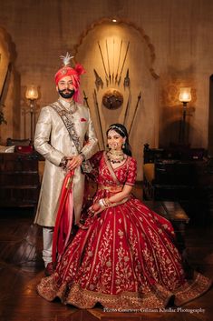 Indian wedding, Rajput wedding, bride and groom, royal look, Indian bridal wear, elegant bridal attire, traditional Indian wedding dress, wedding photography, wedding portraits, bridal look Indian, wedding themes, wedding celebrations, stylish groom, regal bride, royal wedding attire, Rajput groom, Rajput bride, Red lehenga, lehenga for brides, outfit for groom, traditional outfit for groom, safas for  men, bride and groom portrait, wedding photos, bridal jewellery Wedding Outfits Indian Couple, Groom And Bride Wedding Outfit, Bridal Couple Dress Indian, Groom And Bride Poses Indian, Bride And Groom Poses Ideas Indian, Wedding Outfits Indian Bride And Groom, Wedding Reception Looks Indian, Mrg Couple Photography, Wedding Dresses Couple Indian