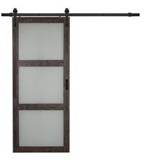 an open sliding door with frosted glass panels and black metal bars on the bottom