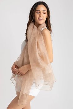 Wear this Sheer Social Wrap Scarf to walk the streets with elegance. Because it is composed of high-quality fabric, it is delightful to the touch. It's the ideal lightweight scarf with a raw hem for breezy days. It will go with anything in your closet. Material : Silk, Rayon Size : 27"x70" Imported Wrap Scarf, Lightweight Scarf, White Silk, The Streets, Scarf Wrap, Quality Fabric, Shawl, Sweater Dress, Champagne