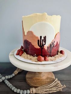 a desert themed cake is displayed on a plate