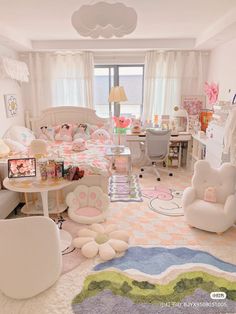 this is a very cute girls bedroom with hello kitty decor