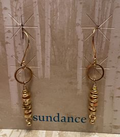 Stacked nuggets hang from loops below French wires. Handmade in USA of 22kt gold-plated Thai silver. Exclusive. 2"L. Artisan Jewelry Earrings, Sundance Catalog, Handcrafted Artisan Jewelry, French Wire, Artisan Jewelry, Silver Gold, Gold Plate, Jewelry Earrings, Plating