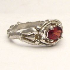 "Handmade Solid Sterling Silver Red Garnet Bone Ring 6x4mm .5ct Sizing and shipping is ALWAYS FREE with a 14 day \"No Questions Asked\" return policy. *In the notes section of your order, please specify ring size.* This ring is made with real gems. I made it myself, so if you see a setting you like and want a different gem in it, I can put in another one as they are not finished. I can probably do it for the same price or real close. I can make these either in gold or sterling silver; just email Garnet Solitaire Ring As Gift, Classic Red Promise Ring, Garnet Solitaire Jewelry Gift, Garnet Solitaire Jewelry As Gift, Garnet Rings In White Gold For Gifts, Garnet White Gold Rings For Gift, Red Solitaire Ring For Promise, Red Solitaire Promise Ring, White Gold Garnet Rings As Gift