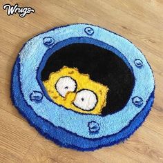 the rug is shaped like a cartoon character