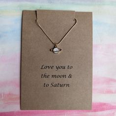 Beautiful handmade saturn necklace Wonderful gift and it comes beautifully presented on an a6 kraft card in a kraft envelope Gold Plated stainless steel Saturn Pendant, Moon And Saturn Necklace, Saturn Necklace, Planet Necklace, Moon Necklace, Stylish Jewelry, Kraft Envelopes, Earring Necklace, Planets