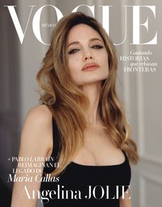 a woman with long hair on the cover of a magazine