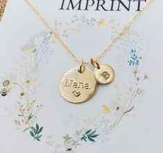 14k Gold filled Grandma Necklace.                 This necklace has one 5/8" 14k gold filled disc and up to 6 smaller initial discs that measure 9mm. Necklace comes with a 18" or 20" 14k gold filled cable chain Please provide the following at checkout in message to seller box: -Name you want stamped ( up to 4 characters )                                            -Initial/initials you would like stamped  Each letter has been individually hand stamped. Because of this, the lettering may have sli Gigi Necklace, Nana Necklace, Grandma Necklace, 4 Characters, Hand Stamped Jewelry, Stamped Jewelry, Necklace Personalized, Stamping Up, Organza Bags