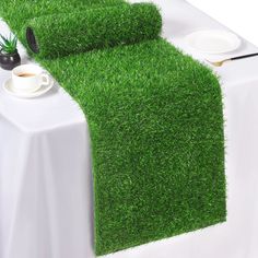 PRICES MAY VARY. Plastic Size details: our artificial grass table runner is 12 x 108 inches/30 x 275 cm, the length of the grass is 1 inch/2.5 cm, thick and durable, you can cut it into any size you want, suitable for most tables, and can be used as a carpet on the floor Realistic design: the grass table runner is made of premium artificial grass, soft and realistic, lightweight and durable; the unique green design looks like real natural grass, offering you green and lawn enjoyment all the time Table Decorations For Spring, Decorations For Spring, Grass Rug, Grass Carpet, Spring Summer Wedding, Faux Grass, Birthday Party Decor, Artificial Grass, Fall Holidays