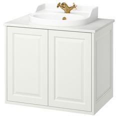 a white sink with gold faucet and cabinet doors on the front, against a white background