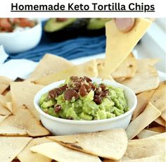 homemade keto tortilla chips with guacamole and bacon