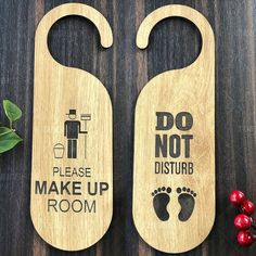 two wooden door hangers with the words do not disturb and make up room on them