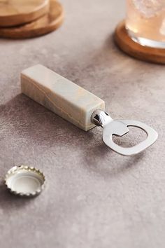 a bottle opener sitting on top of a table